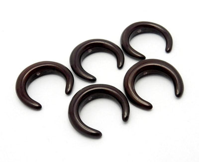 angled shot of brown crescents on white background