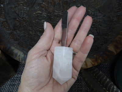 Crystal Quartz Butter Spreader displayed in hand
