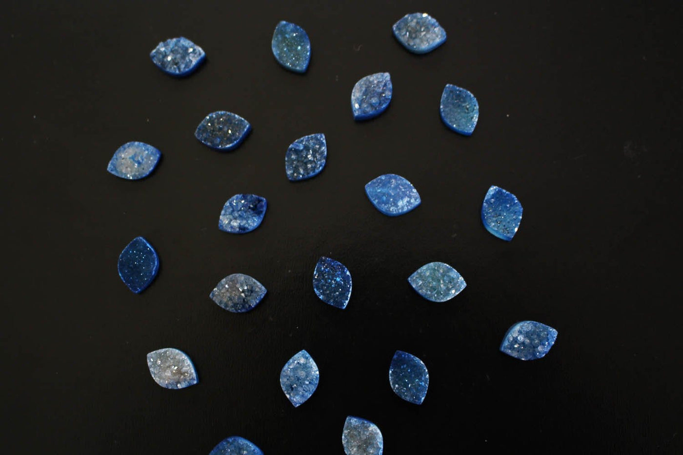 Cabochon - Blue Marquise Druzy Cabochon - Colorful Druzy Stone - scattered on a table