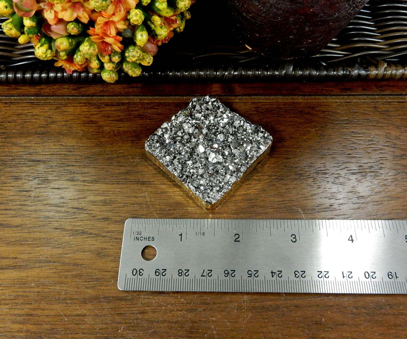 bead next to ruler for size reference