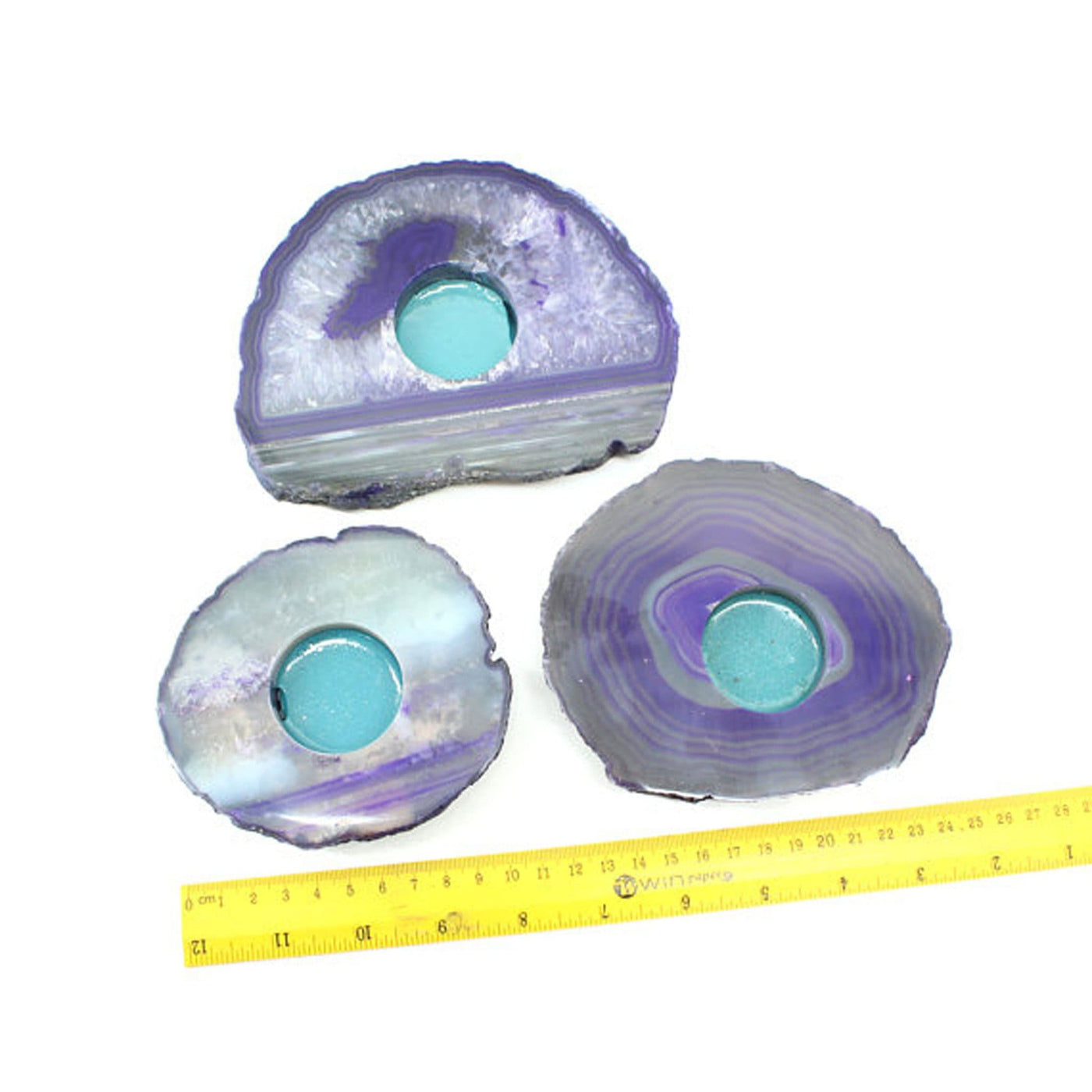 agate slab candle holders next to a ruler for size reference