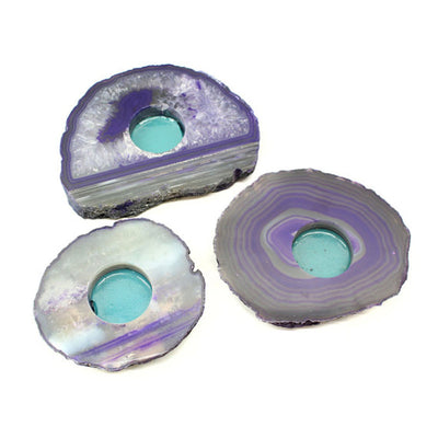 agate slab candle holders on white background