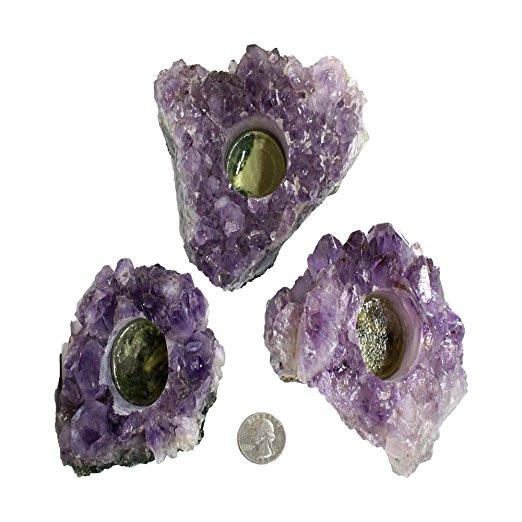 Picture of 3 amethyst candle holders, next to a quarter 