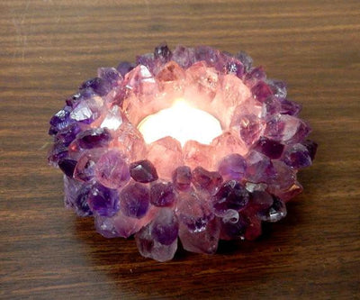 close up of amethyst point candle holder for details