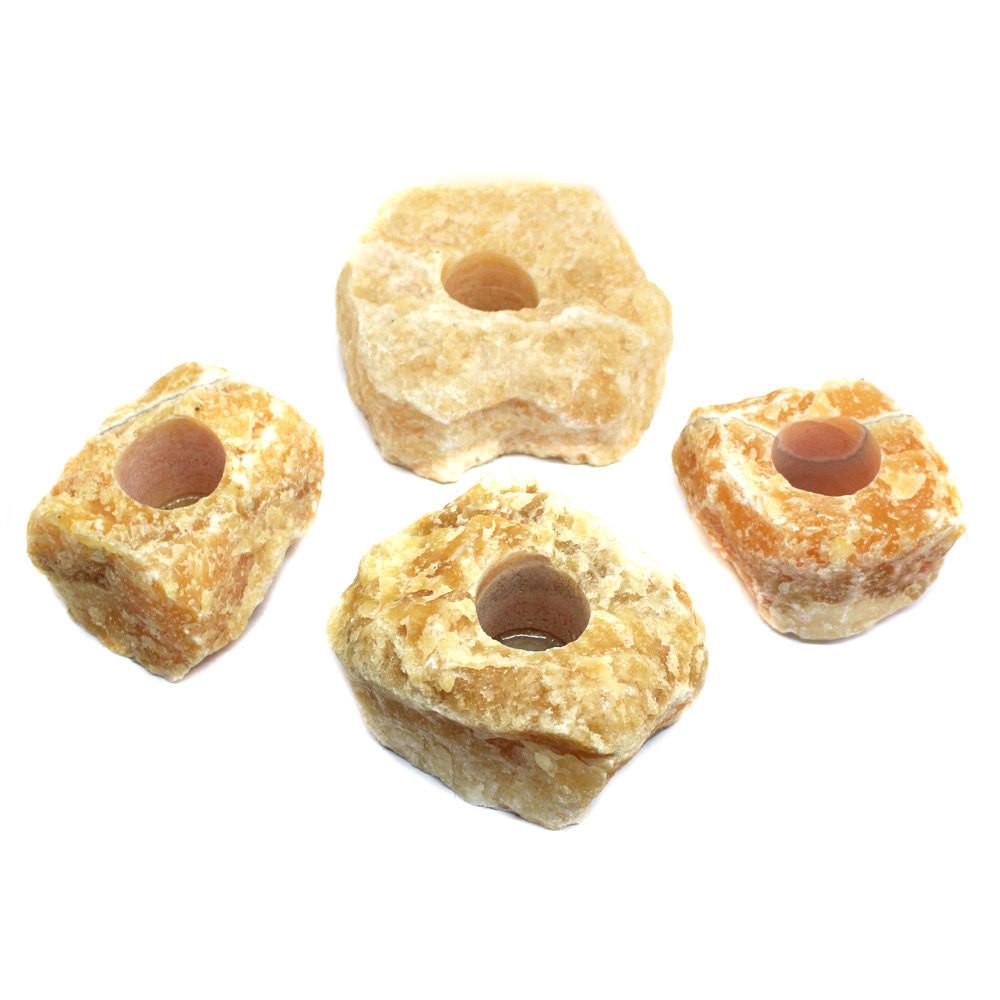 4 Mexican Orange Calcite Candle Holders shown from top angle
