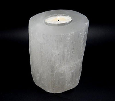 selenite candle holder with candle 