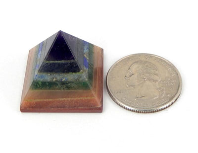 pyramid next to a quarter for size reference 