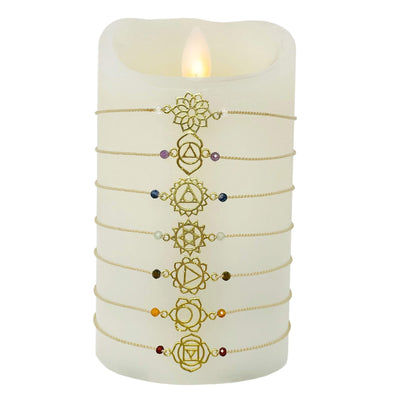 chakra bracelet set in gold displayed to show the differences in the bracelets 