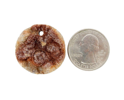 bead next to a quarter for size reference 