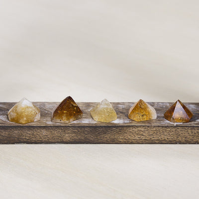 golden amethyst pyramids side view to show size variations