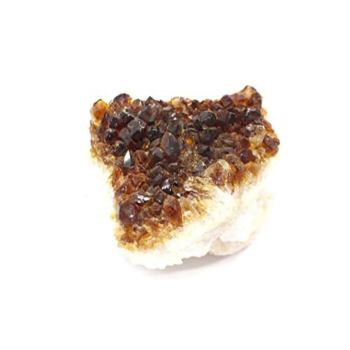 up close shot of citrine cluster on white background