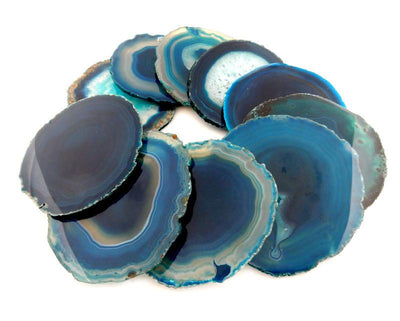 Teal agate coasters expanded to show size, color and pattern variation.