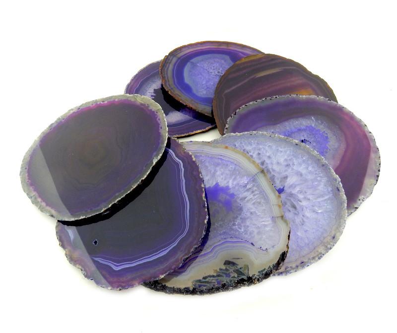 Purple agate coasters expanded to show size, color and pattern variation.