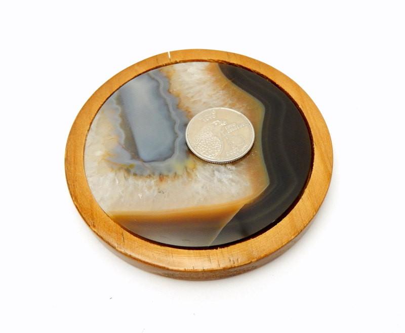 Quarter on top of agate coaster to show size approximation.