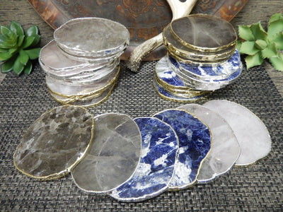 Stone Slices - Coaster Size fanned out and stacked up to chow varying colors on rose quartz, sodalite and smoky quartz stones