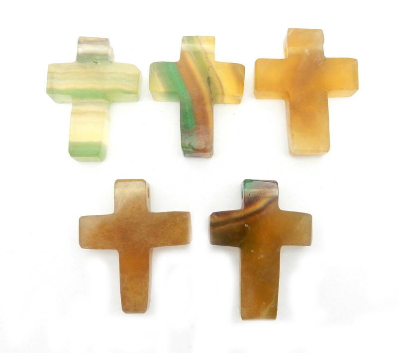 Rainbow Fluorite Cross Pendant Charms laid out showing varying markings and colors of stock 