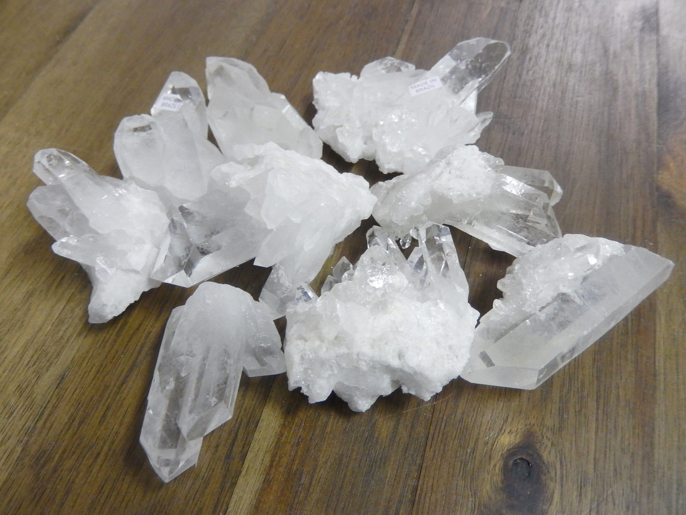 Crystal Cluster - Crystal Quartz Cluster - ONE (1) Gorgeous Clear Crystal Quartz Point - a bunch in a pile on a table