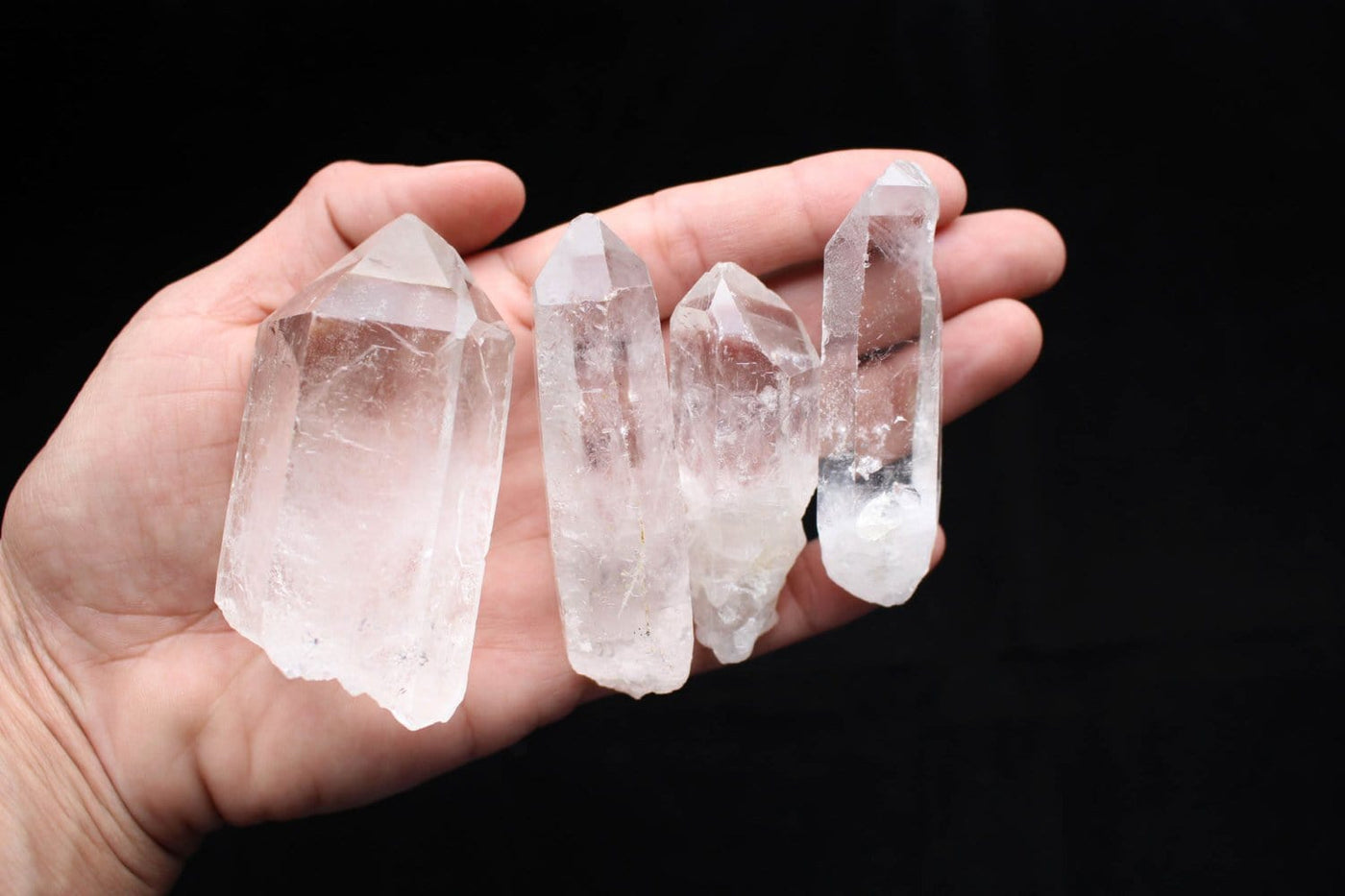 Four Crystal Point 5-8cm on hand for size comparison 