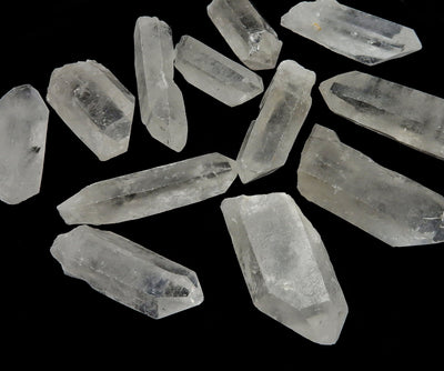 Crystal Point 8-12cm on a table to show variations in size and shape