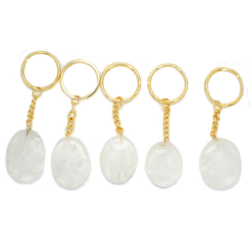 Natural Crystal Quartz  Stone Keychain  with gold links and keychain hoop displayed to show variation