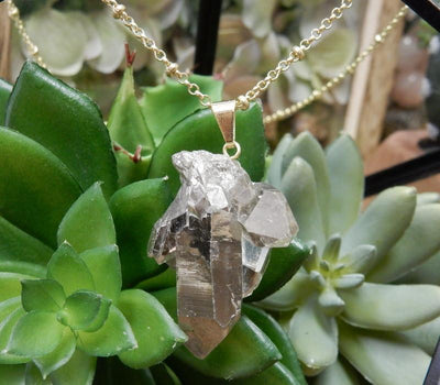 Crystal Quartz with Mystic Silver Titanium Crystal Cluster Point Pendant With Gold Bail shown here on a chain