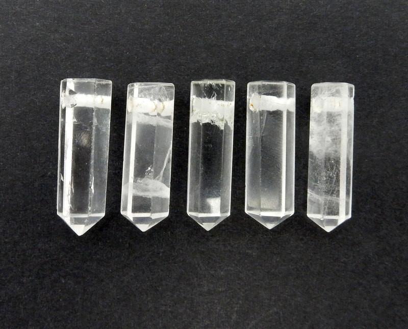 multiple Crystal Quartz Pencil Point Beads with Top Side Drilled to show various characteristics between each point