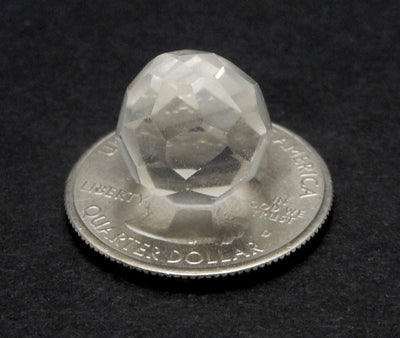 Crystal Quartz Sphere  on a quarter