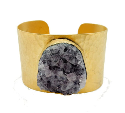 Amethyst Cuff with thick gold plated band and amethyst cluster in the center.