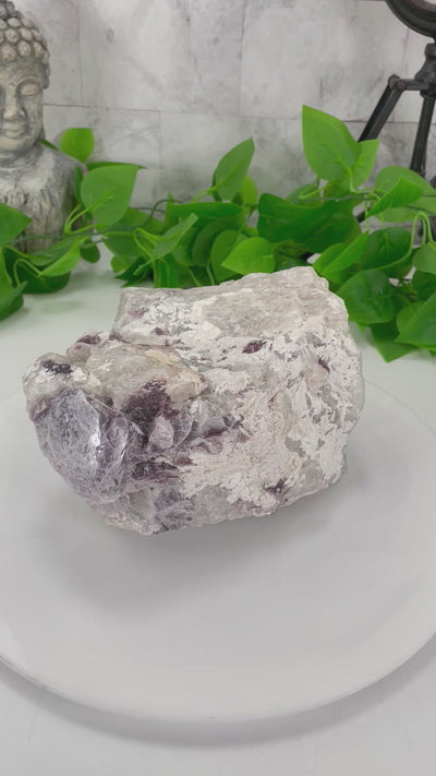 360 video of purple lepidolite with flashes of mica cluster to show all sides