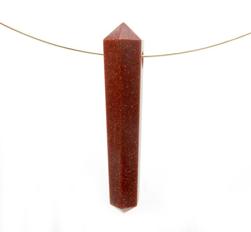 Goldstone Pencil Point Bead on a wire on white background
