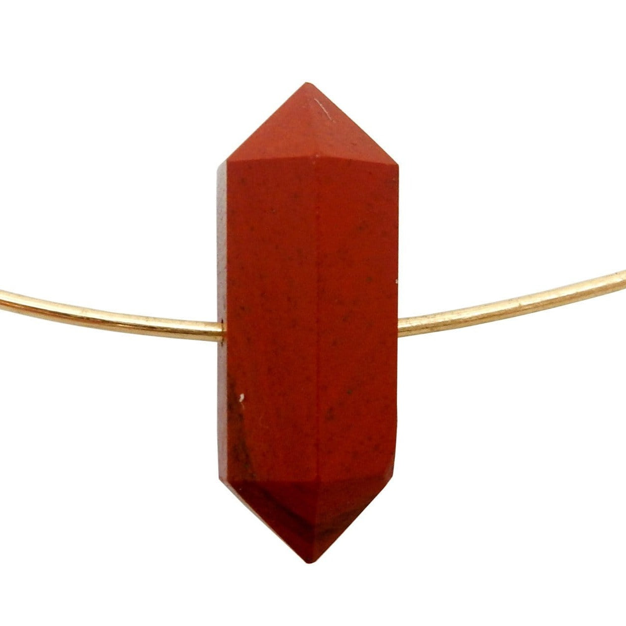 SIngle Petite Red Jasper Double Terminated Pencil Point with wire through drilled hole (wire not included) in white background