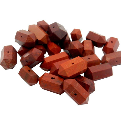 Bundle of Petite Red Jasper Double Terminated Pencil Points in white background angle view 
