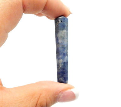 sodalite double terminated pencil point bead in hand for size reference
