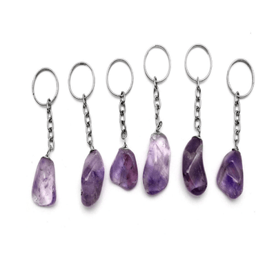 Tumbled Amethyst Silver Toned Key Chains - 6 on a table