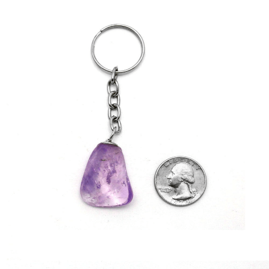 Tumbled Amethyst Silver Toned Key Chain next to a  quarter