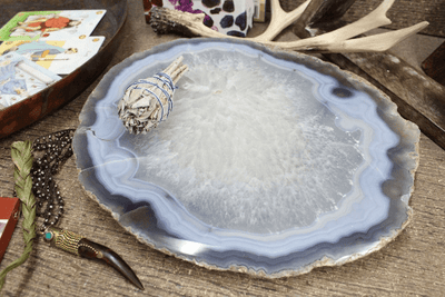 Picture of agate Platter, with sage on top of it for display.