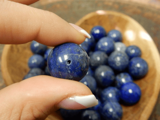 Lapis Lazulli Drilled Sphere  - held in by 2 fingers