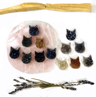 Natural Druzy Cat Cabochon - on a platter and on a table