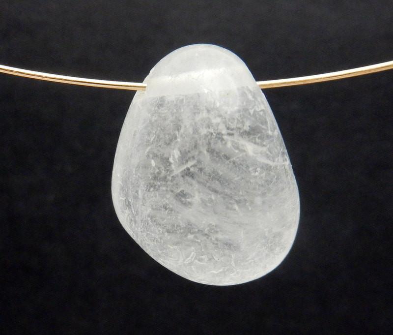 Drilled Tumbled Stone Crystal Quartz Polished Bead with Wire Shown as a Necklace on Black Background