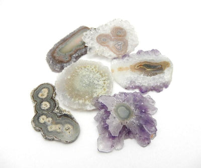6 pieces of a Druzy Amethyst Stalactite in different shades of Purple