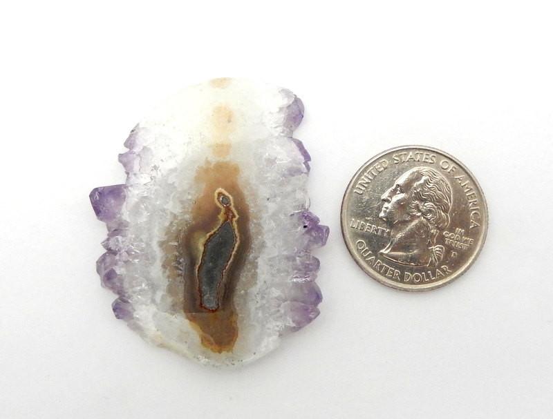 Druzy Amethyst Stalactite next to a quarter for size reference 