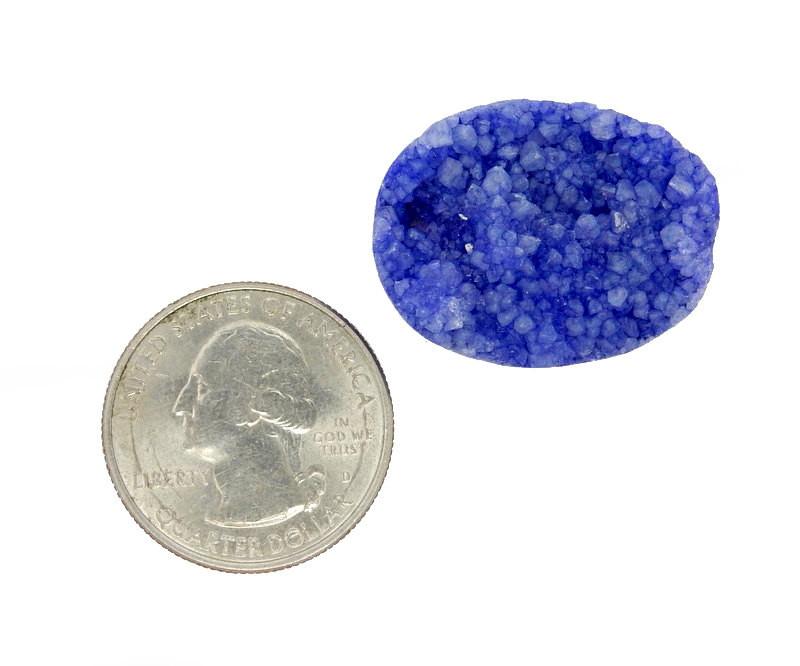druzy bead next to a quarter for size reference