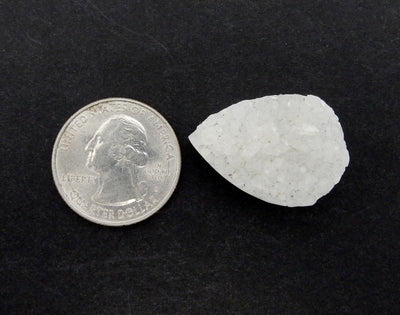 Large White Teardrop Druzy Bead next to quarter for size reference