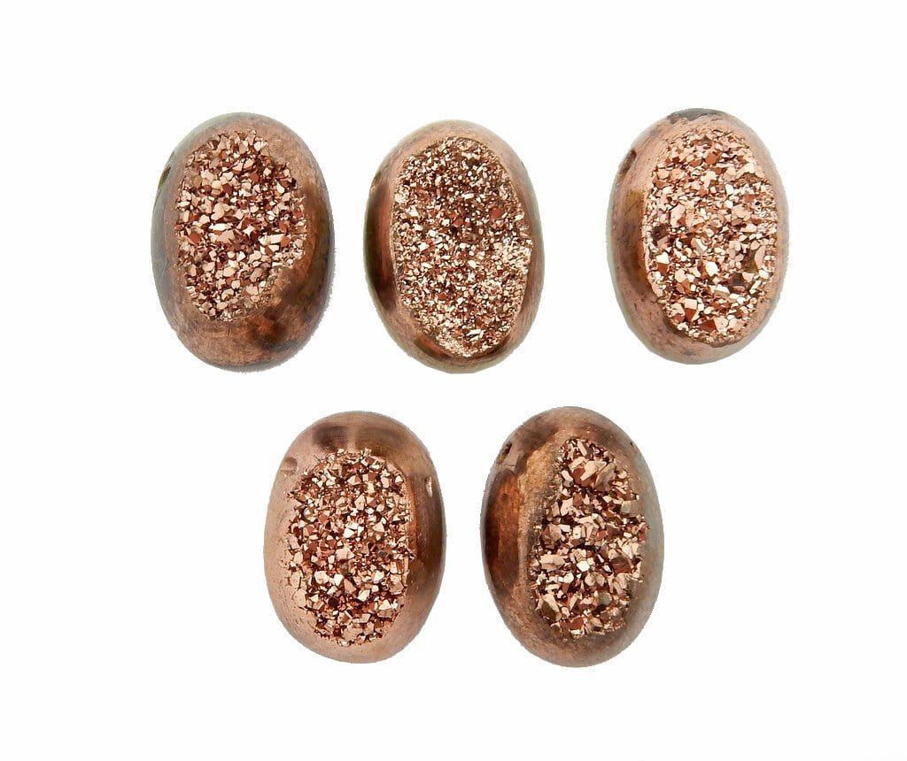 5 Brown Colored Titanium Oval Shaped Druzy Cabochons displayed to show various texture and formations