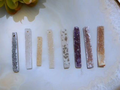 Druzy bar drilled, showing different colors of the druzy