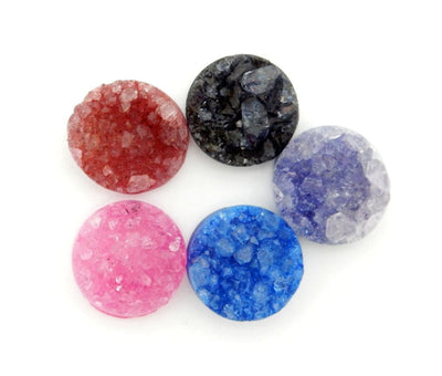 multiple color Druzy Cabochons displayed to show they come in red black blue pink and purple