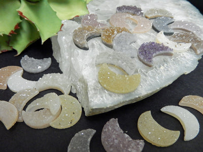 angled shot of Druzy Moon Cabochons with decorations