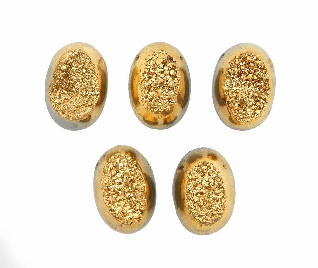 multiple gold titanium oval beads displayed to show the differences in the druzy types 