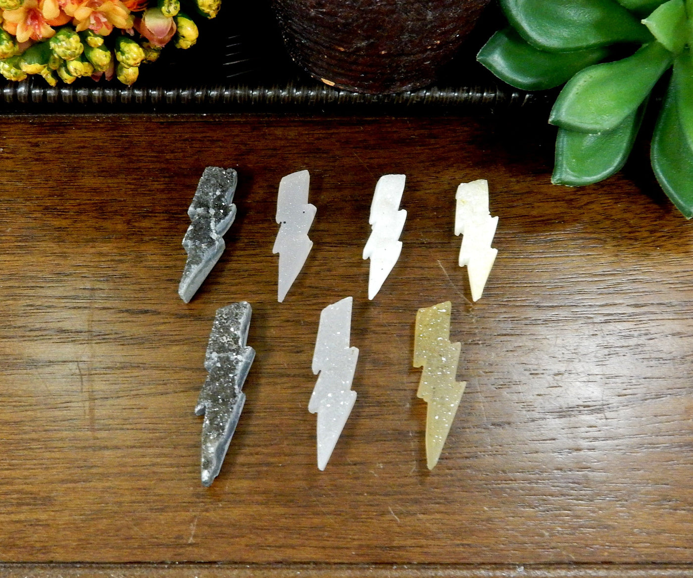 Natural Druzy Lightning Bolt Shaped Cabochon - lined up on a table
