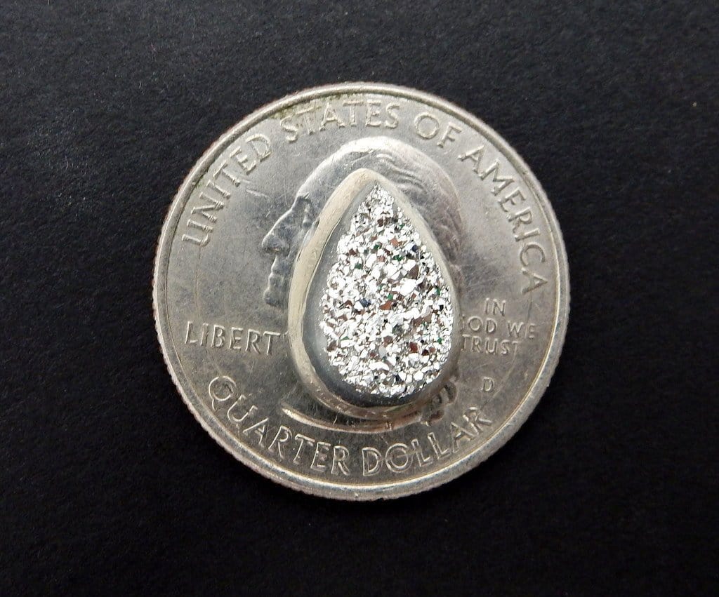 Druzy Cabochon - Platinum Colored Titanium Teardrop Shaped Druzy Cabochon on a quarter
